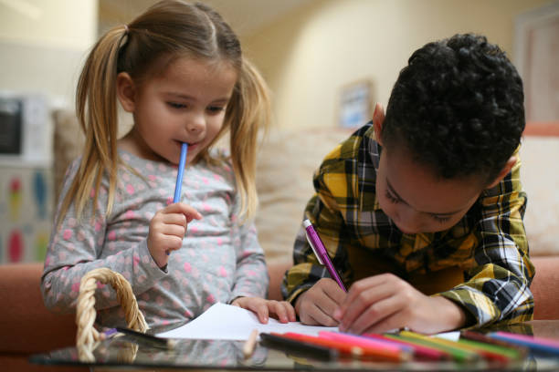 istock Little smart girl and boy. 645531956