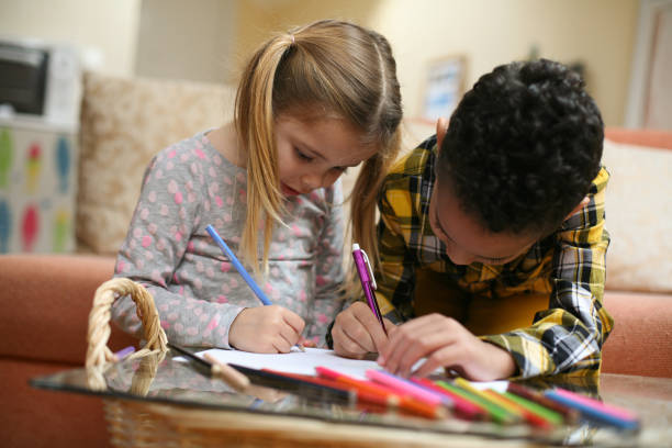 istock Little smart girl and boy. 645534056