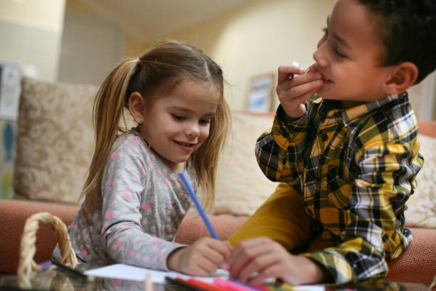 istock Little smart girl and boy. 645534182