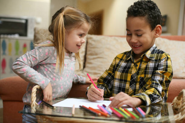 istock Little smart girl and boy. 645534226