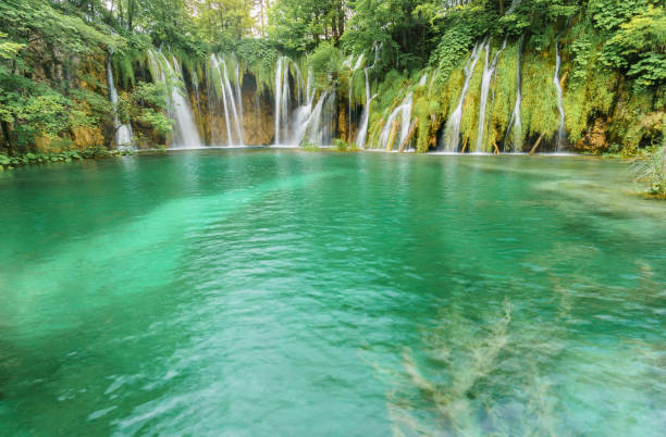 istock Beautiful Turquoise Lake and Waterfalls 645547018