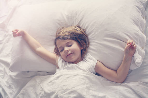 istock Cute little girl in bed. 645549164
