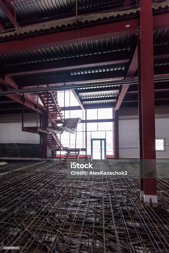 Building Structures Inside Iron Structures Being Built Inside A Large Warehouse Stock Photo ...
