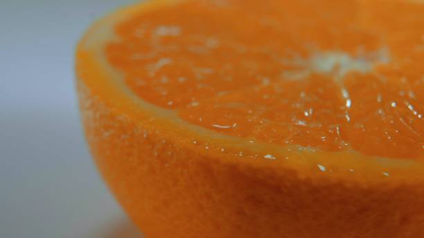 istock Fresh sliced orange - close up shot 645578798