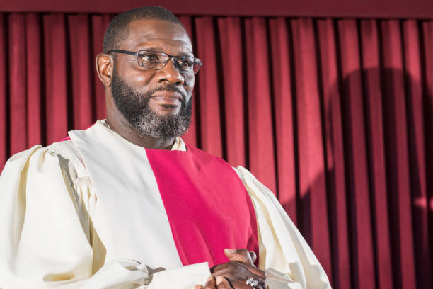 istock Mature black man in church choir 645583630