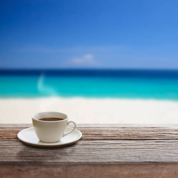 istock Coffee cup top view on wooden table background 645584282