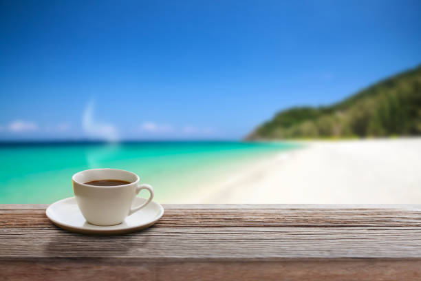 istock Coffee cup top view on wooden table background 645584302
