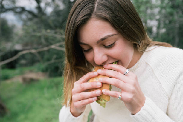 istock Teen Eating Sandwich 645589174