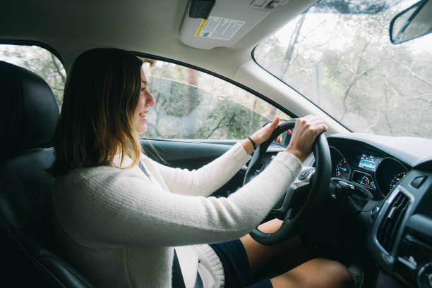 istock Teen Smiling Driving Car Fast Unlicensed 645589344