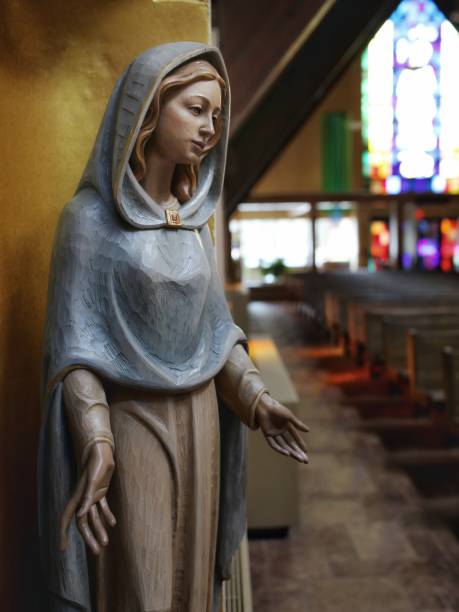 Wooden Carved Virgin Mary Catholic Statue in Church stock photo