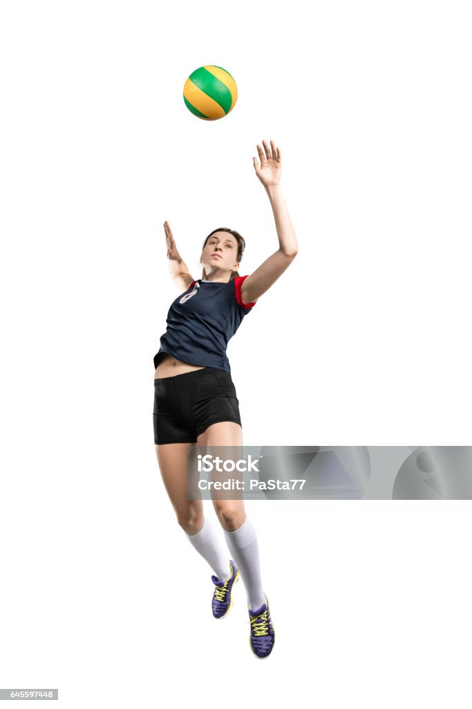 Mujer jugador de vóleibol golpear la pelota  - Foto de stock de Juego de vóleibol libre de derechos