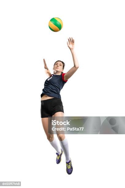 Photo libre de droit de Femme Frapper Le Ballon Joueur De Volleyball banque d'images et plus d'images libres de droit de Volley-ball - Volley-ball, Ballon de volley, Objet ou sujet détouré