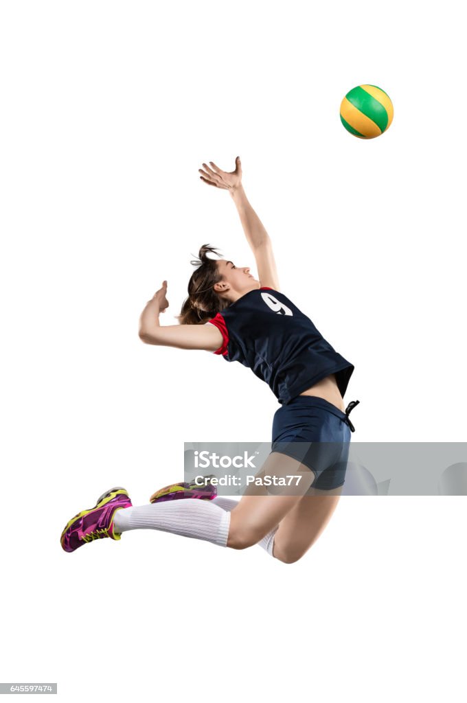 Female volleyball player hitting the ball Female volleyball player in the air before hitting the ball isolated on white background Volleyball - Ball Stock Photo