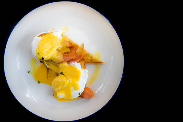 istock Egg Benedict with smoked salmon and fresh Hollandaise sauce 645597688