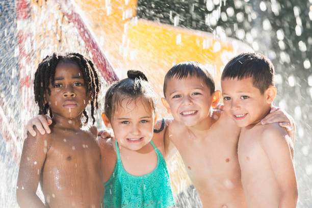 istock Multi-ethnic children at a water park 645600854