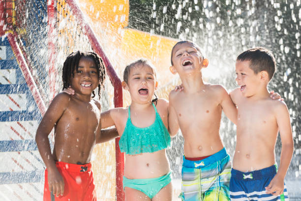 istock Multi-ethnic children at a water park 645600888