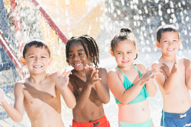 istock Multi-ethnic children at a water park 645600900