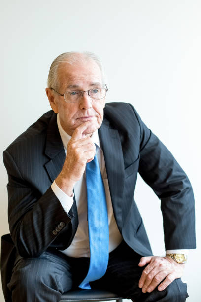 istock Pensive senior boss finding decision for business 645619120