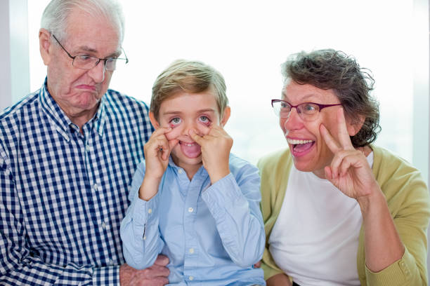 istock Playful Grandparents and Grandson Making Faces 645622494
