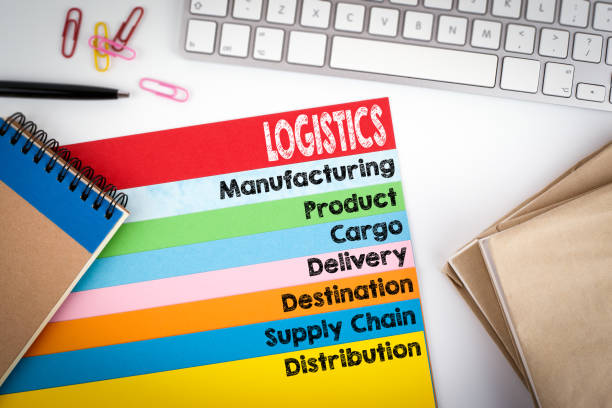istock Logistics. Office desk with a computer keyboard and color pages 645622810
