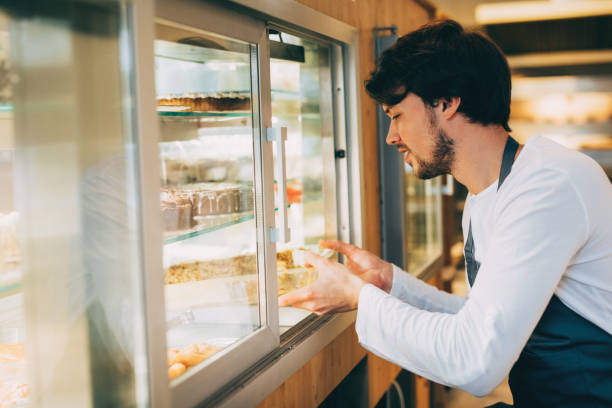 istock Chef  taking food out of the fridge 645632886