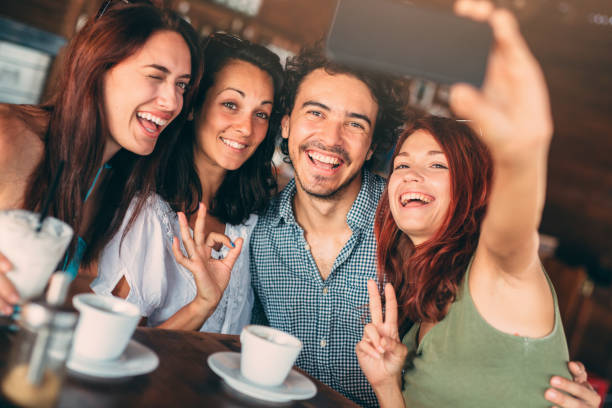 istock Friends taking a selfie at the cafe 645632922