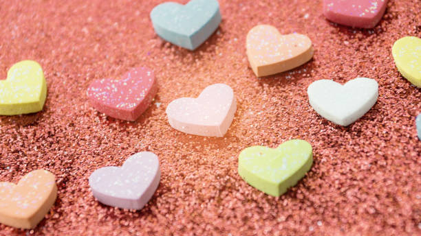 istock heart on a red glitter abstracts for a background. 645643122