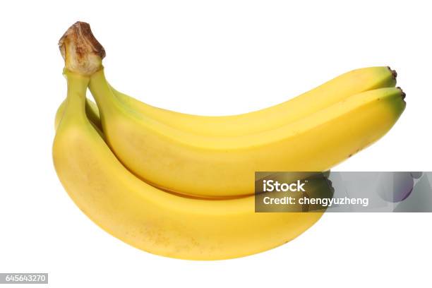 Isolated Shot Of Bunch Of Bananas On White Background Stock Photo - Download Image Now