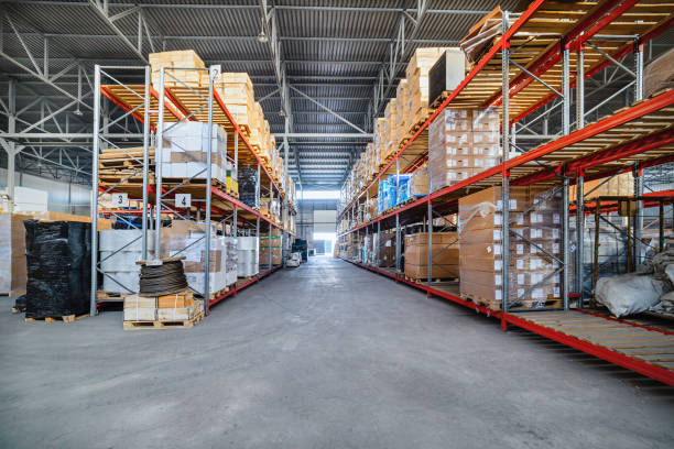 istock Long shelves with a variety of boxes and containers 645647072