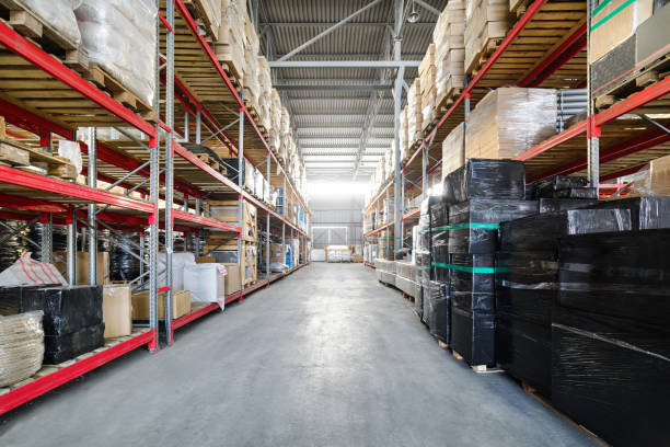 istock Long shelves with a variety of boxes and containers 645647722