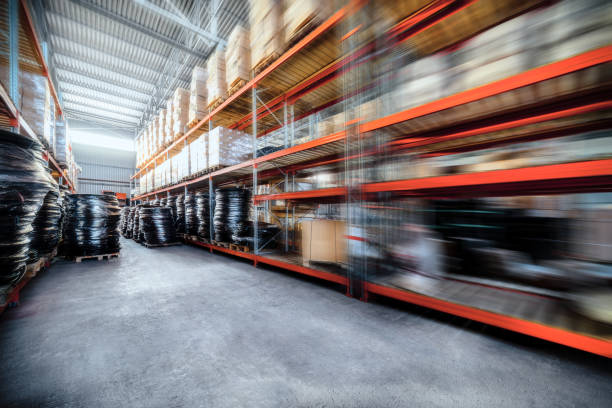 istock Long shelves with a variety of boxes and containers 645648608