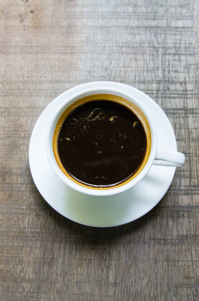 istock Barista making a cup of coffee soft focus image . 645653278