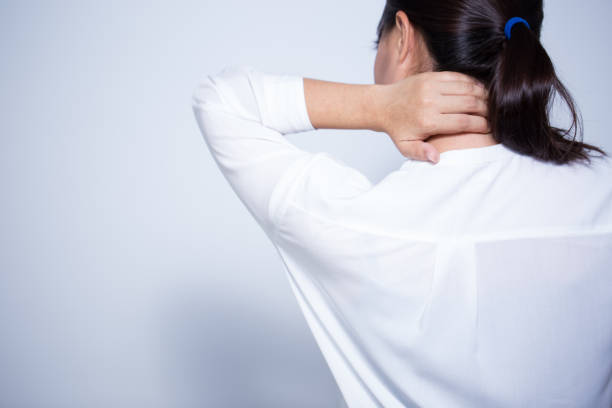 istock Woman has neck pain 645655704