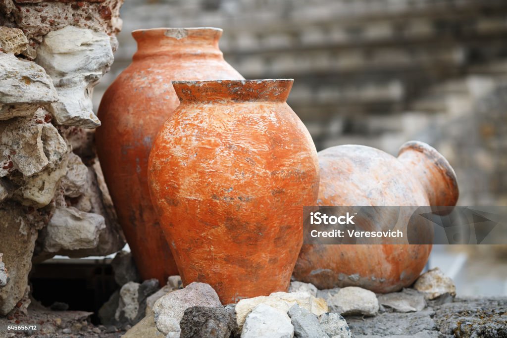 Ancient clay vases Old ancient clay vases outdoors. Still life of ceramic pots. Shallow depth of field. Selective focus. Pottery Stock Photo
