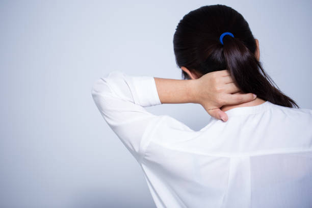 istock Woman has neck pain 645659292