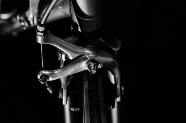 istock low key black and white silhouette of bicycle black background 645660576