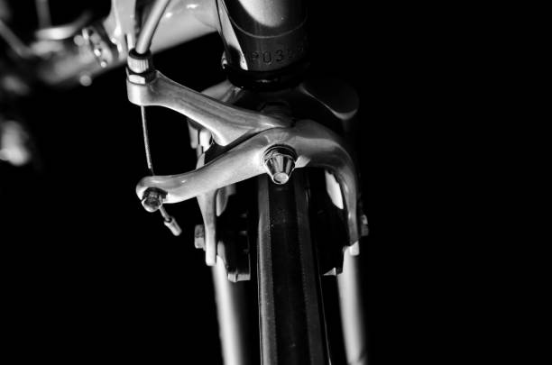 istock low key black and white silhouette of bicycle black background 645663210