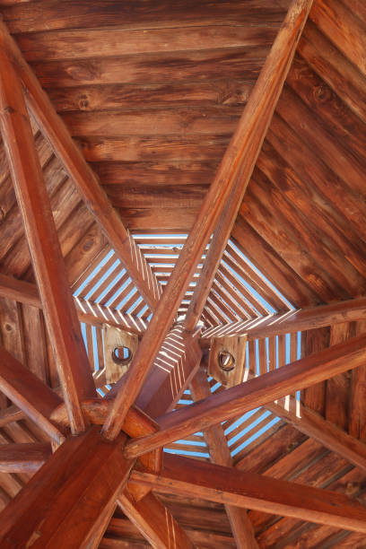 through wooden sunshade see the sky close-up