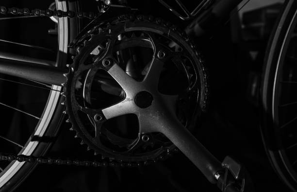 istock low key black and white silhouette of bicycle black background 645667174