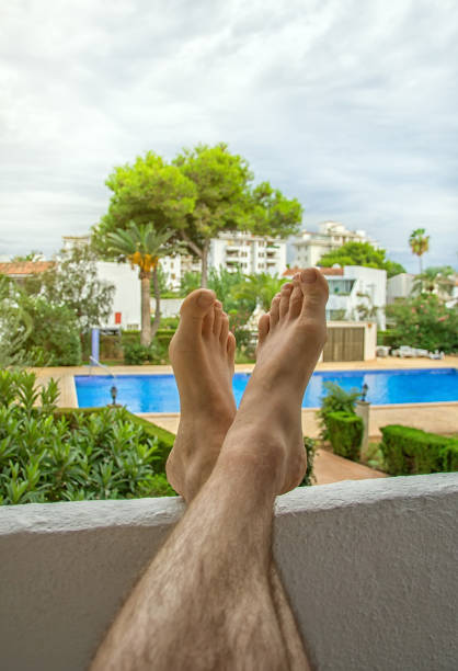 istock Man enjoying the view from the balcony. 645667586