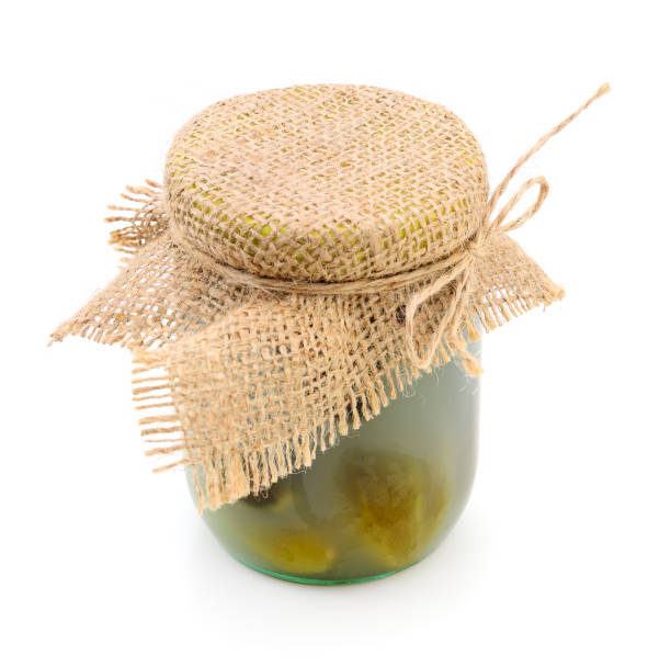 istock Cucumbers in a glass jar. 645673486