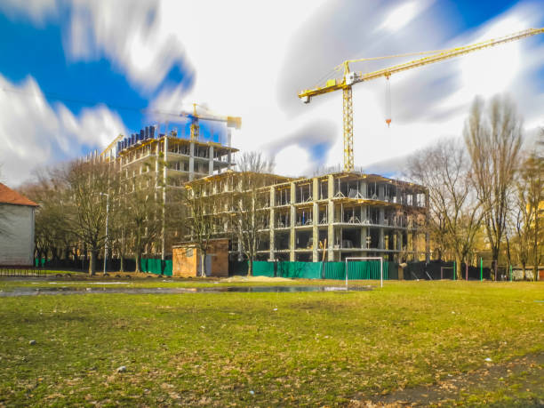 istock Crane construction bricks concrete building in the city 645681786