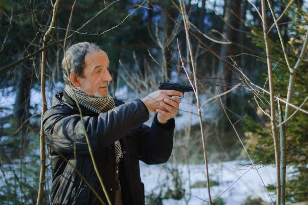istock The man with the gun 645687336