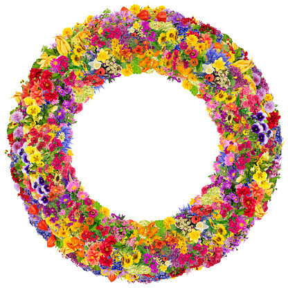 Summer concept floral round frame  is made of fresh summer flowers. Isolated abstract handmade collage collage.