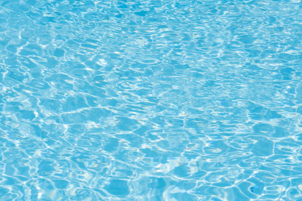 istock Beautiful ripple wave and blue water surface in swimming pool 645701476