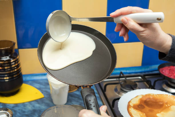 istock The process of cooking pancakes on a hot skillet 645704802