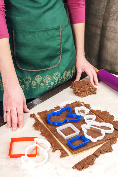 istock Cutting out dough for shaped as a rabbit gingerbread 645709022