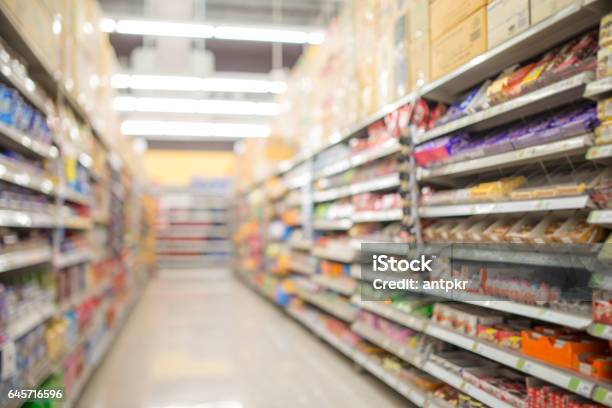 Defocused Of Shelf In Supermarket Stock Photo - Download Image Now - Supermarket, Shelf, Market - Retail Space