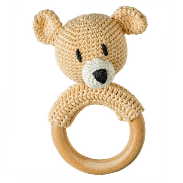 istock knitted children's toy bear isolated on white background 645718812