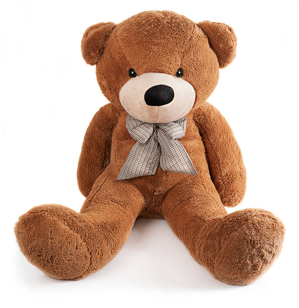 istock Brown toy bear isolated on white 645718898